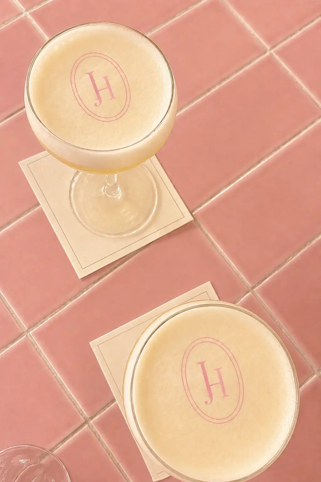 Cocktails on pink tiles with Jayne Hill Studio monogram coasters